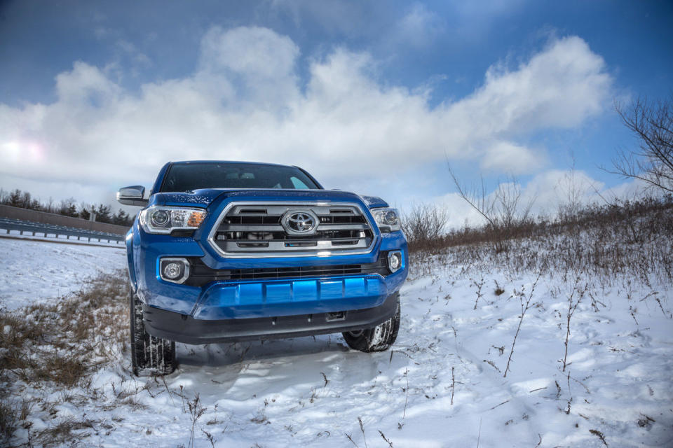 It brings a lot of the 4Runner's aggressive angularity to the front end, without aping that design. What's similar: the large grille and a massive lower element. The difference is that in the Tacoma, the two are separated by a small horizontal grille opening. It's frankly a much more attractive and cohesive front fascia.