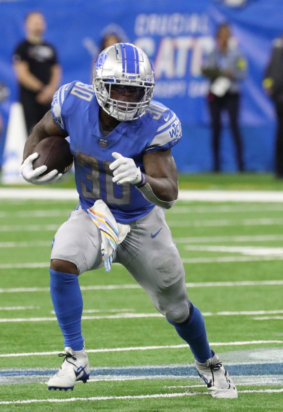 Detroit Lions running back Jamaal Williams runs vs. the Seattle Seahawks during the second half at Ford Field, Oct. 2, 2022.