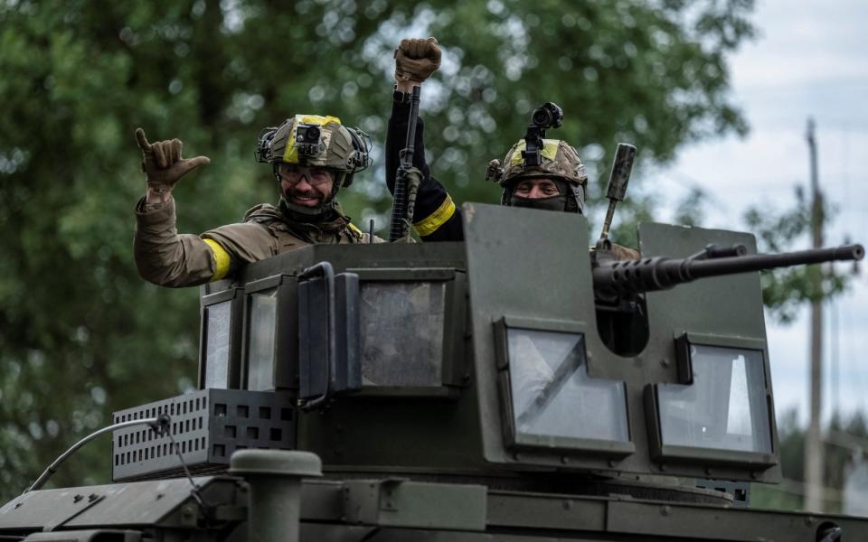 Ukrainian military in Vovchansk, near the Russian border - VIACHESLAV RATYNSKYI/REUTERS