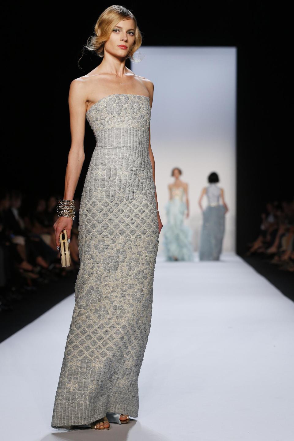 The Badgley Mischka Spring 2014 collection is modeled during Fashion Week in New York, Tuesday, Sept. 10, 2013. (AP Photo/John Minchillo)