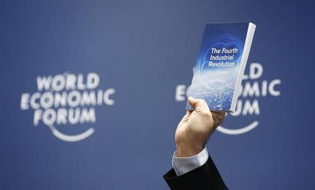 World Economic Forum (WEF) Executive Chairman and founder Klaus Schwab presents his book, 'The Fourth Industrial Revolution', during a news conference in Cologny, near Geneva, January 13, 2016. REUTERS/Denis Balibouse