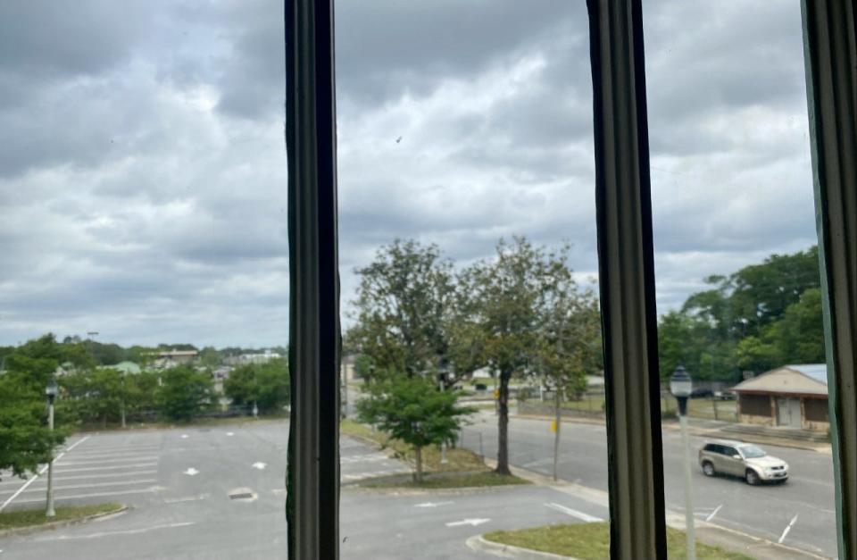 The view looking north toward the railroad tracks and Crestview City Hall from a second-floor window at the historic Lorenza Bush House. The house soon will contain a city history museum.