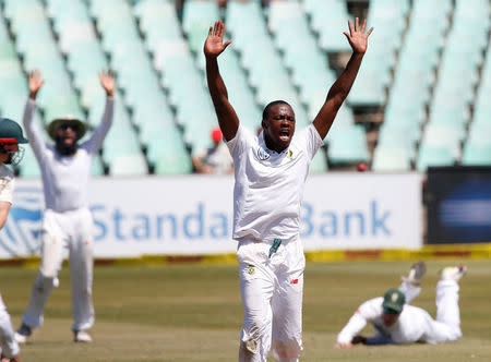 Cricket - South Africa vs Australia - First Test Match - Kingsmead Stadium, Durban, South Africa - March 3, 2018. South Africa's Kagiso Rabada appeals unsuccessfully for the wicket of Australia's Shaun Marsh. REUTERS/Rogan Ward