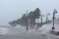 <p>Waves crash against the seawall as Hurricane Irma slammed across islands in the northern Caribbean on Wednesday, in Fajardo, Puerto Rico, Sept. 6, 2017. (Photo: Alvin Baez/Reuters) </p>