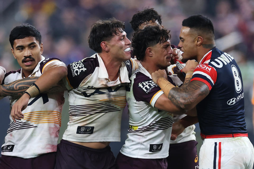 LAS VEGAS, NEVADA - MARCH 02: Spencer Leniu (r) of the Roosters exchanges heated words with Kotoni Staggs of the Broncos during the round one NRL match between Sydney Roosters and Brisbane Broncos at Allegiant Stadium, on March 02, 2024, in Las Vegas, Nevada. (Photo by Ezra Shaw/Getty Images)