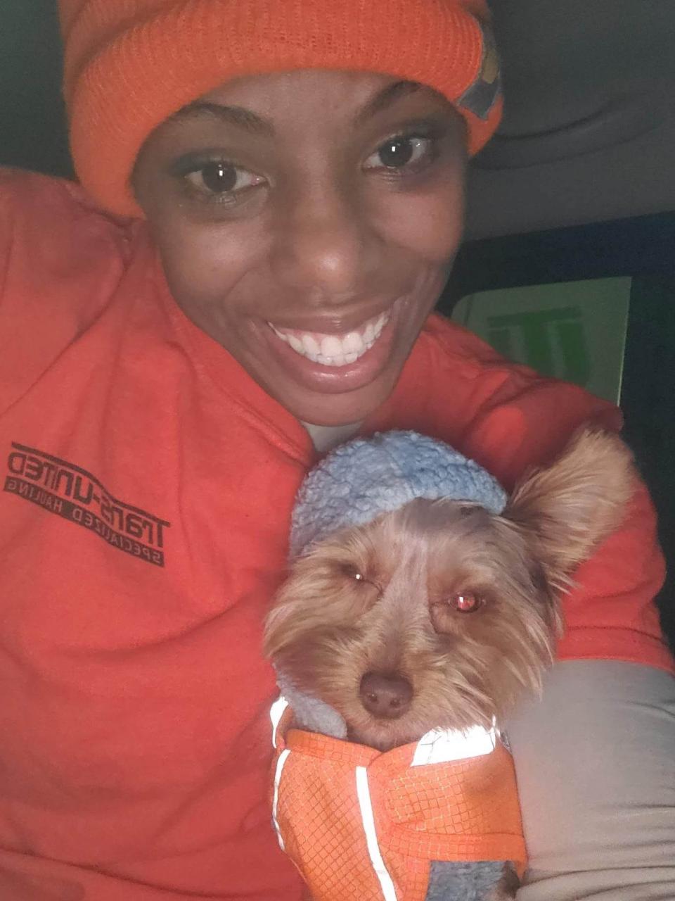 Jenice Turner's Yorkie Whosay keeps her company on the road and help keep her safe by barking if anyone approaches her truck.