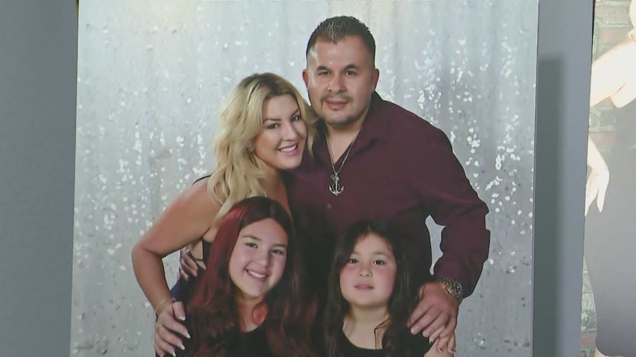 Michele Atilano, her husband, Arturo Atilano-Valdez, and their two daughters in a family photo. 