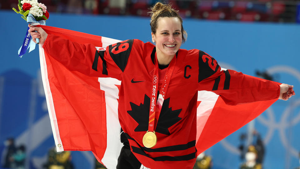 Marie-Philip Poulin of Team Canada celebrates with a gold medal after defeating the United States in the women's hockey final at the 2022 Beijing Winter Olympic Games. (Photo by Elsa/Getty Images)