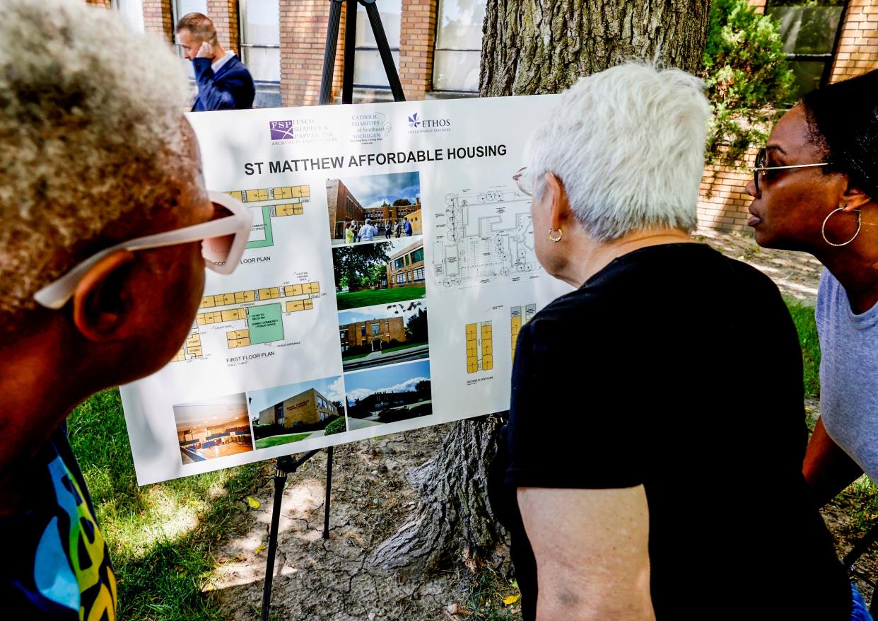 People who live around the St. Matthews parish in Detroit get a closer look at renderings of affordable housing coming to the former St. Matthews School on Thursday, June 23, 2022.
The former Catholic school will be will be a 46 unit housing complex called The Residences at St. Matthews and will cost $17 million and take two years to complete.