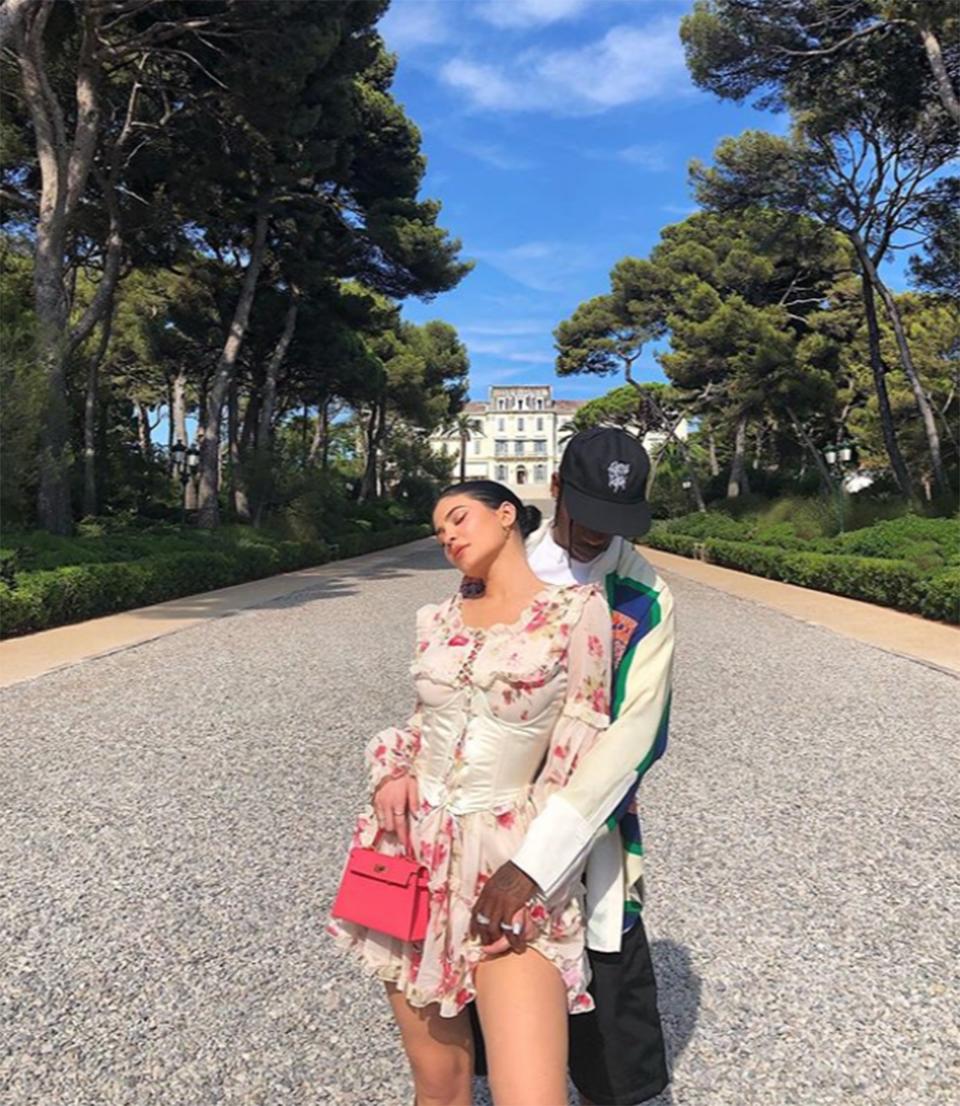 Travis and Kylie struck a pose in France. 