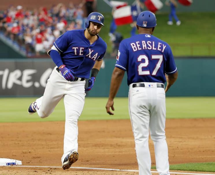 Joey Gallo rounds third past base after launching the first of his two home runs in a 6-2 win against the Royals. (AP)