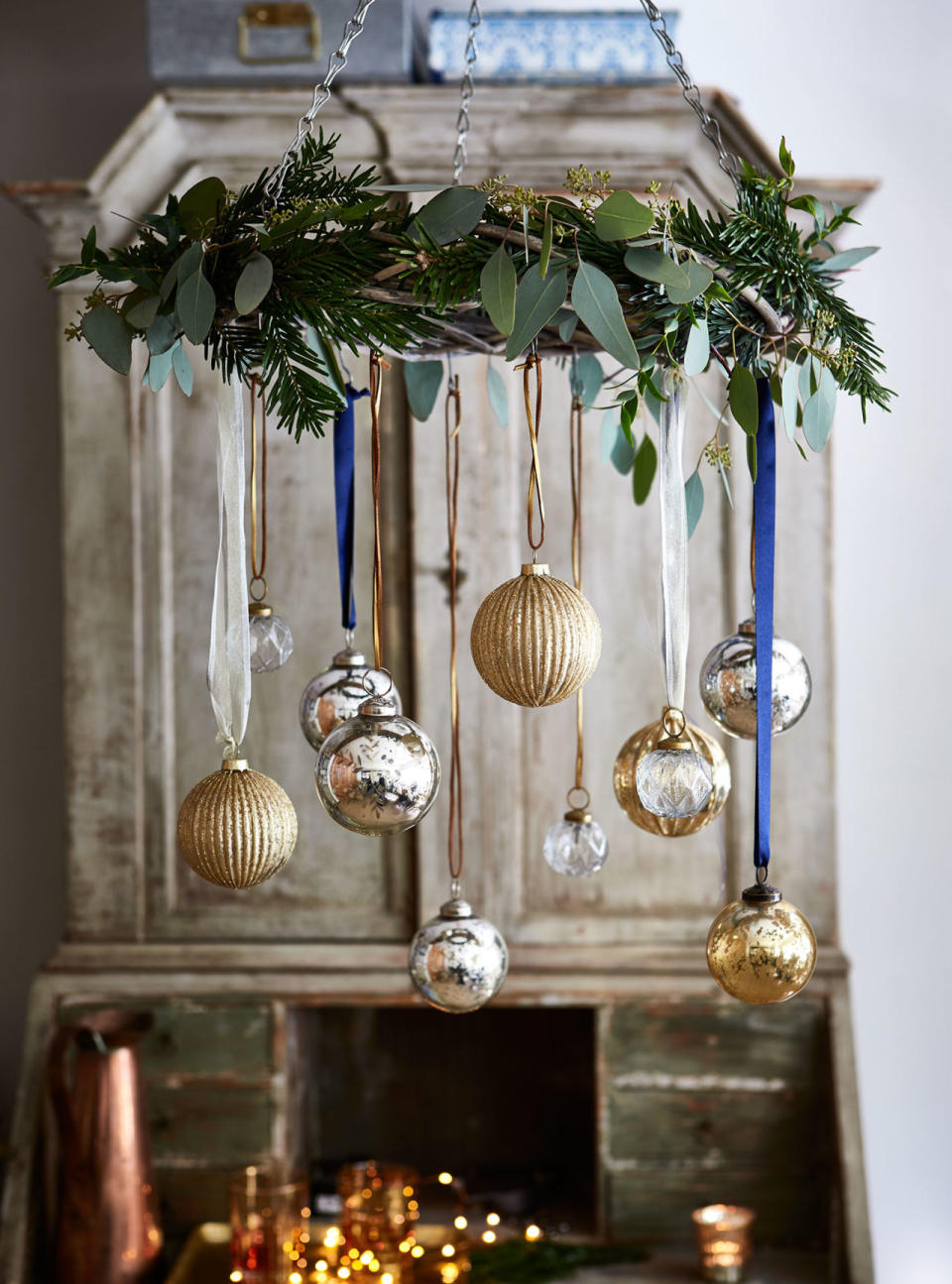 <p>This centrepiece adds a celebratory feel above a table. Suspend glittery metallic baubles with ribbons from a wreath covered in fresh evergreens. </p><p>• Natural wicker display wreath with hooks, <a rel="nofollow noopener" href="https://www.pipii.co.uk/natural-wicker-display-wreath-with-hooks.html" target="_blank" data-ylk="slk:£17.50, Pipii;elm:context_link;itc:0;sec:content-canvas" class="link ">£17.50, Pipii</a>. </p><p>• Baubles, from a selection, <a rel="nofollow noopener" href="https://www.pipii.co.uk/" target="_blank" data-ylk="slk:Pipii;elm:context_link;itc:0;sec:content-canvas" class="link ">Pipii</a> and <a rel="nofollow noopener" href="https://www.dobbies.com/" target="_blank" data-ylk="slk:Dobbies;elm:context_link;itc:0;sec:content-canvas" class="link ">Dobbies</a>. </p><p>• Ribbons, from a selection, <a rel="nofollow noopener" href="https://janemeans.com/" target="_blank" data-ylk="slk:Jane Means;elm:context_link;itc:0;sec:content-canvas" class="link ">Jane Means</a>.</p>