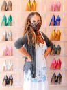 <p>Sarah Jessica Parker strikes a pose in her flagship store in New York City on Wednesday. </p>