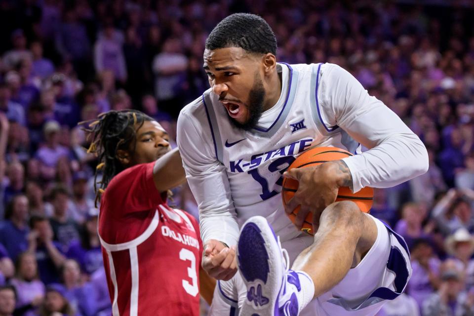 Kansas State guard Desi Sills (13) grabs a rebound in front of Oklahoma's Otega Oweh (3) during their March 1 game in Manhattan.