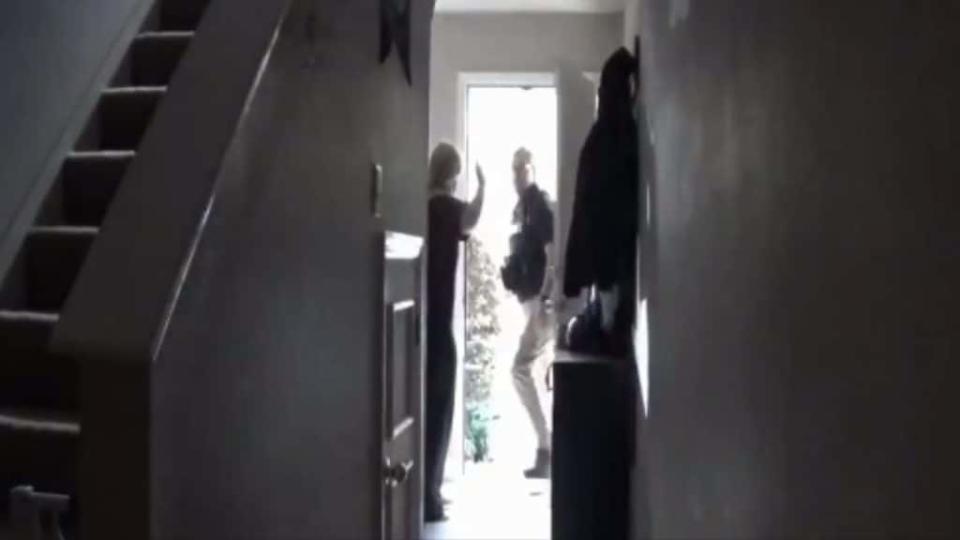 According to Rebekah Jones, armed Florida agents pointed guns at her and her children. Above is a picture from the video clip she posted of the raid, in which officers are seen entering her home with guns drawn.