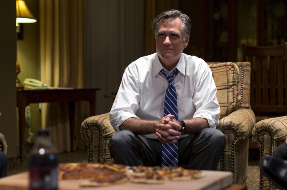 Republican presidential candidate, former Massachusetts Gov. Mitt Romney watches the vice presidential debate in his hotel room on Thursday, Oct. 11, 2012 in Asheville, N.C. (AP Photo/ Evan Vucci)