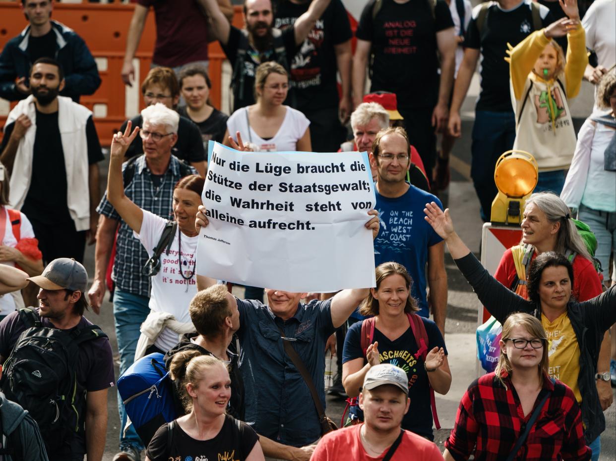 Protests were widespread around Berlin and saw violent outbursts as protesters defied orders to disperse and tried to break through police lines (EPA)