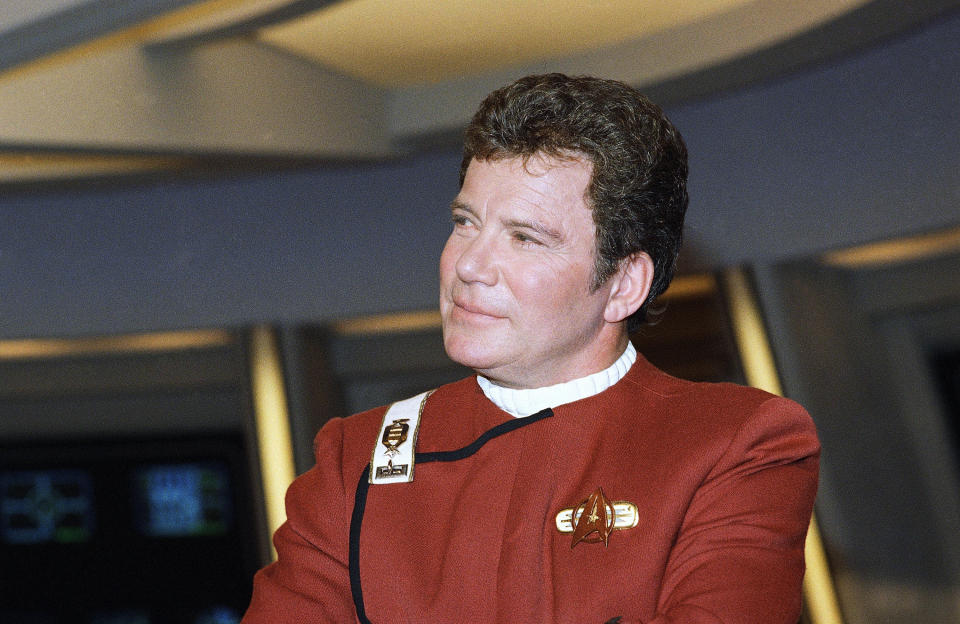 FILE - In this 1988 file photo, William Shatner, who portrays Capt. James T. Kirk, attends a photo opportunity for the film "Star Trek V: The Final Frontier." Star Trek’s Captain Kirk is rocketing into space this month — boldly going where no other sci-fi actors have gone. Jeff Bezos’ space travel company, Blue Origin, announced Monday, Oct. 4, 2021 that Shatner will blast off from West Texas on Oct. 12. (AP Photo/Bob Galbraith)