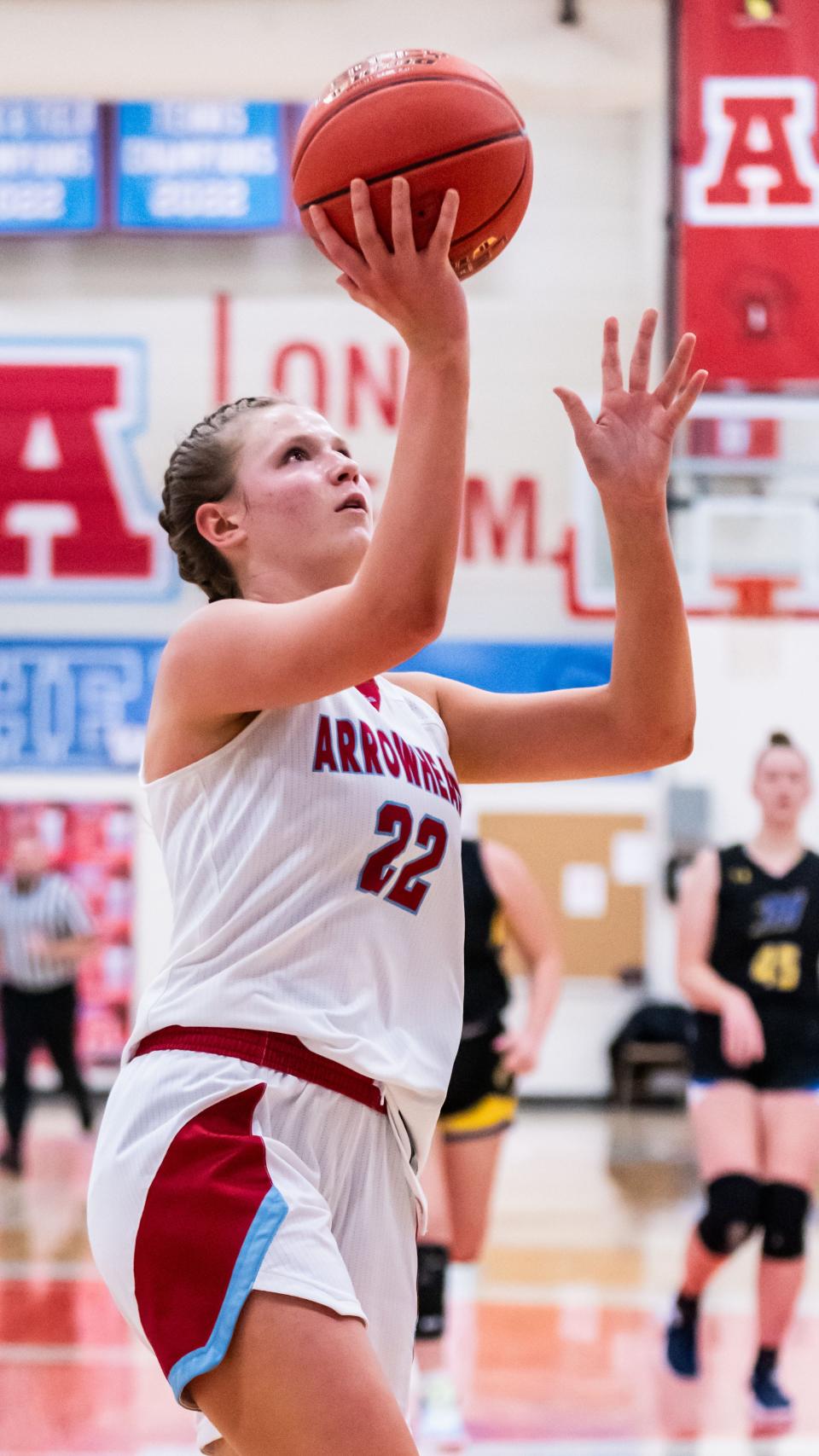 Arrowhead's Natalie Kussow (22) drives in for a layup during the game at home against Mukwonago, Wednesday, Jan. 24, 2024.