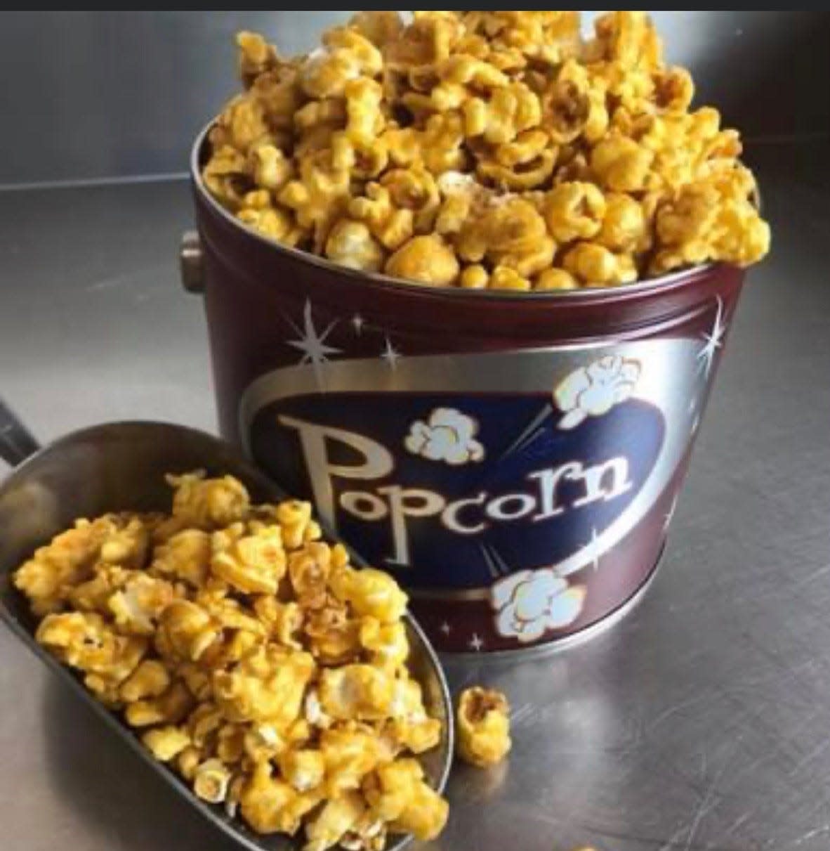 Caramel popcorn is among the best-selling flavors at Popcorn Paradise in Marine City. Tins filled with flavored popcorn are hot sellers this Christmas.
