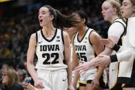 Iowa's Caitlin Clark yells during the first half of the NCAA Women's Final Four championship basketball game against LSUSunday, April 2, 2023, in Dallas. (AP Photo/Tony Gutierrez)