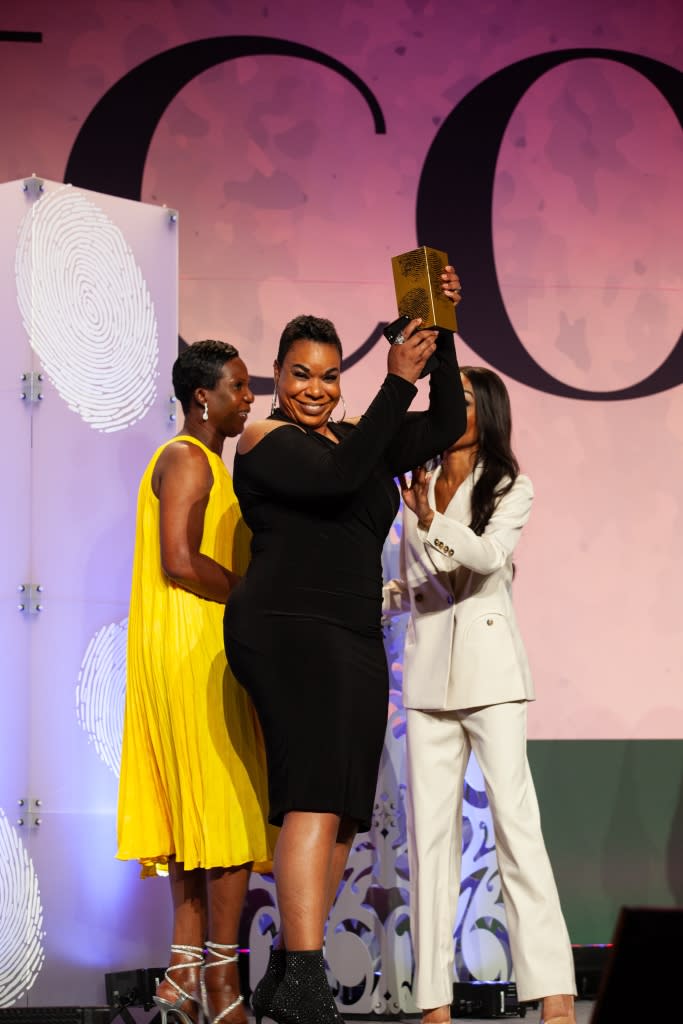 Natalie and Derrica Wilson of BAMFI receiving award at 2022 Clue Awards. Photo courtesy of CrimeCon