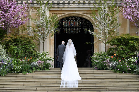 Lady Gabriella Windsor walks into the chapel with her father Prince Michael of Kent for her wedding to Thomas Kingston at St George's Chapel in Windsor Castle, near London, Britain May 18, 2019. Chris Jackson/Pool via REUTERS