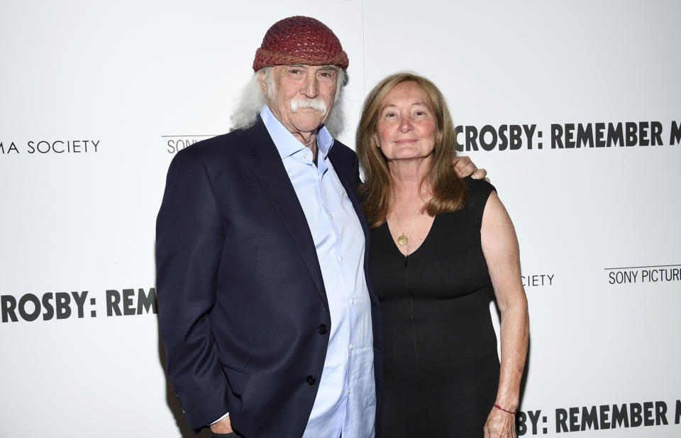 FILE - Musician David Crosby and wife Jan Dance attend a special screening of "David Crosby: Remember My Name," hosted by Sony Pictures Classics and The Cinema Society, at The Roxy Cinema, Tuesday, July 16, 2019, in New York. Crosby, the brash rock musician who evolved from a baby-faced harmony singer with the Byrds to a mustachioed hippie superstar and an ongoing troubadour in Crosby, Stills, Nash & (sometimes) Young, has died at age 81. His death was reported Thursday, Jan. 19, 2023, by multiple outlets. (Photo by Evan Agostini/Invision/AP, File)