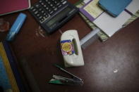 The logo of the 969 movement is seen on a paper puncher at the head office of Buddhist group Ma Ba Tha in Yangon August 26, 2015. REUTERS/Soe Zeya Tun