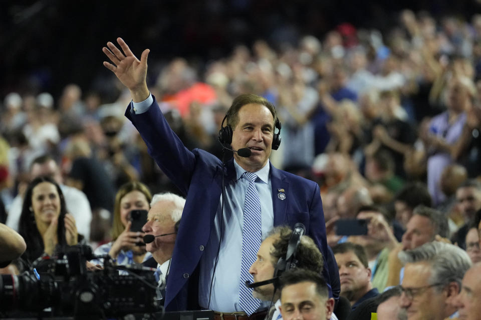 Apr 1, 2023; Houston, TX, USA; CBS broadcaster Jim Nantz acknowledges the crowd in the semifinals of the Final Four of the 2023 NCAA Tournament between the Florida Atlantic Owls and San Diego State Aztecs at NRG Stadium. Mandatory Credit: Robert Deutsch-USA TODAY Sports