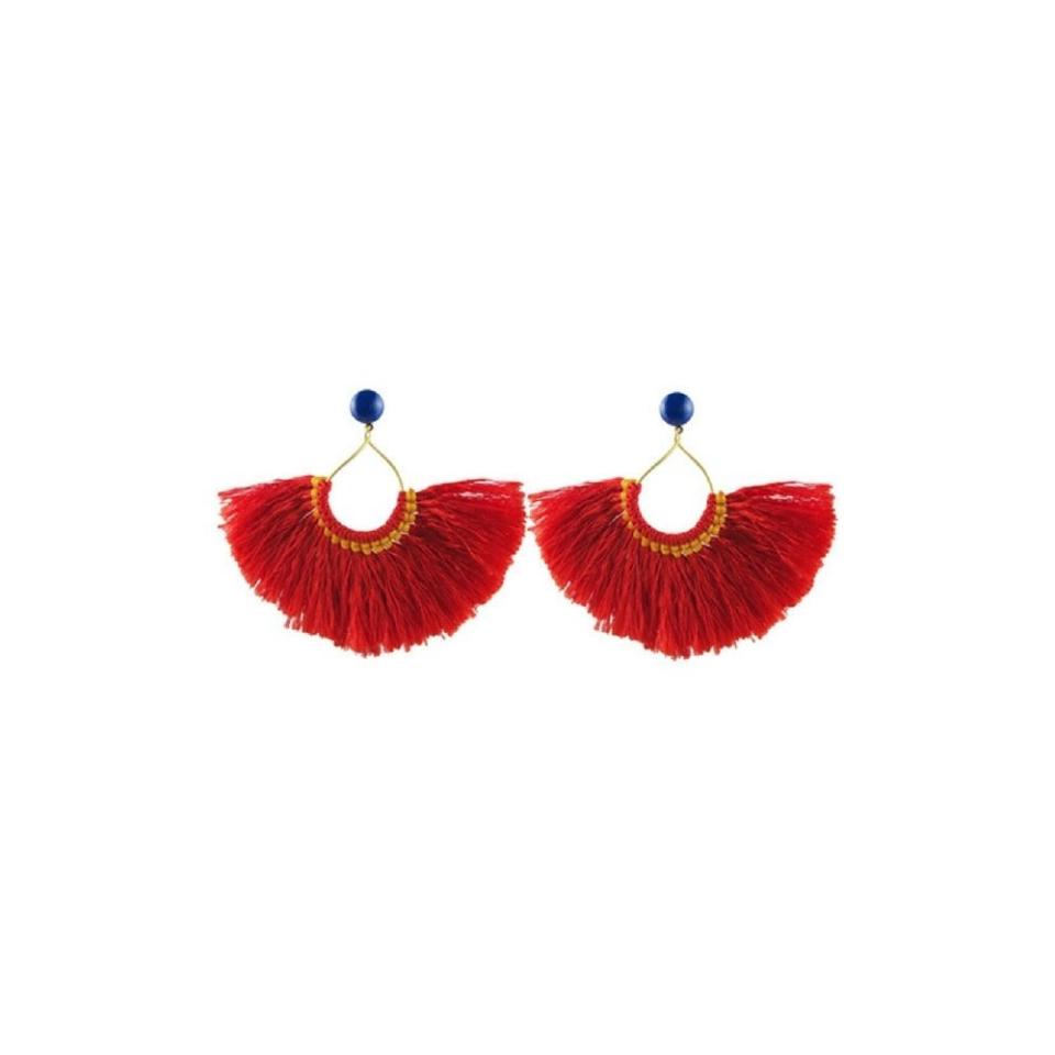 Nothing like a bold red to stand out from the crowd. Shop the pair <a href="https://www.ahalife.com/product/149000056263/onyx-turquoise-earrings-zuha" target="_blank">here</a>.