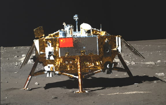 The Chinese flag is clearly visible on the moon in this photo taken of China's Chang'e 3 moon lander by the country's Yutu lunar rover (the country's first moon rover) in December 2003. China has said a manned mission to the moon is one of its