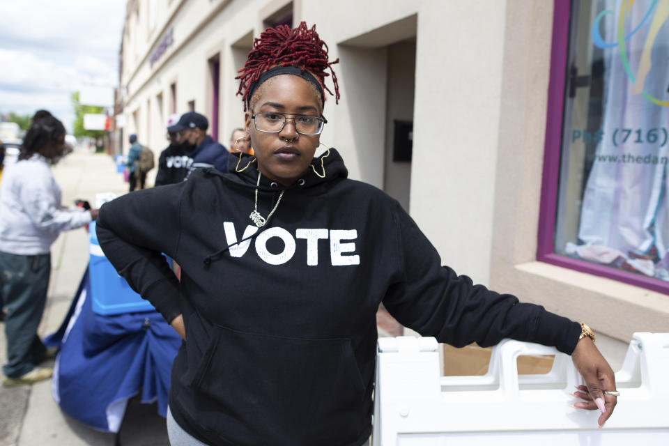 Jillian Hanesworth, with Open Buffalo, poses for a photo, Tuesday, May 17, 2022, in Buffalo, N.Y. Hanesworth was born and raised on Buffalo's East Side. (AP Photo/Joshua Bessex)