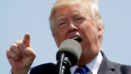 FILE PHOTO: U.S. President Donald Trump speaks during the United States Coast Guard Academy Commencement Ceremony in New London, Connecticut, U.S., May 17 2017. REUTERS/Kevin Lamarque/File Photo