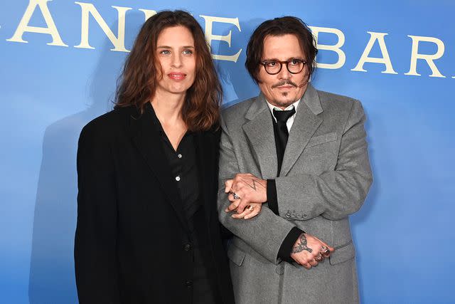 <p>Dave Benett/WireImage</p> Maiwenn and Johnny Depp on April 15, 2024