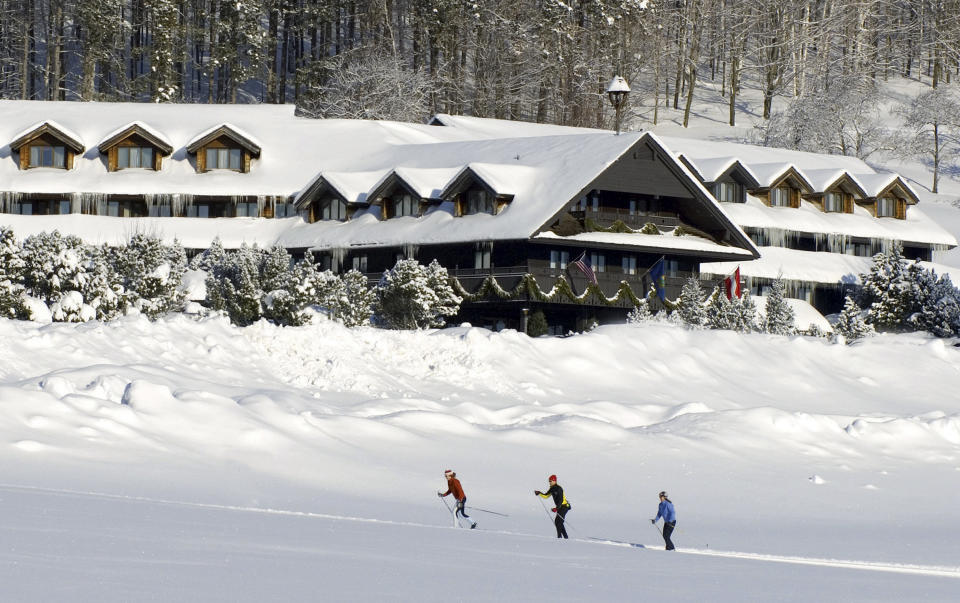 FILE - This undated file photo provided by the Trapp Family Lodge shows cross-country skiers outside the lodge in Stowe, Vt. After a televised update of "The Sound of Music" on Dec. 5, 2013, the hills of Vermont were alive with phones ringing at the lodge. Three-quarters of a century after the singing family arrived from Austria, they're still in demand at the 96-room chalet style inn they started. The family moved to the spot in 1942 after visiting Vermont on a singing tour and vacationing in Stowe. (AP Photo/Trapp Family Lodge, File)