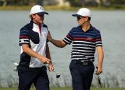 Sep 29, 2016; Chaska, MN, USA; Brandt Snedeker of the United States talks with Zach Johnson of the United States on the tenth hole during a practice round for the 41st Ryder Cup at Hazeltine National Golf Club. Mandatory Credit: Rob Schumacher-USA TODAY Sports