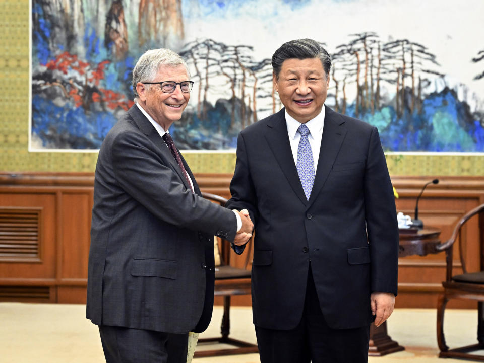 In this photo released by China's Xinhua News Agency, Bill Gates, left, meets with Chinese President Xi Jinping in Beijing, Friday, June 16, 2023. Microsoft's co-founder Bill Gates has met with Chinese President Xi Jinping just days after a visit to Beijing by Tesla CEO Elon Musk. The state broadcaster CCTV showed Xi saying he was happy to see Gates, who he called an "old friend," after three years without meeting during the pandemic. (Yin Bogu/Xinhua via AP)