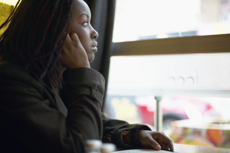 woman looking out of a window