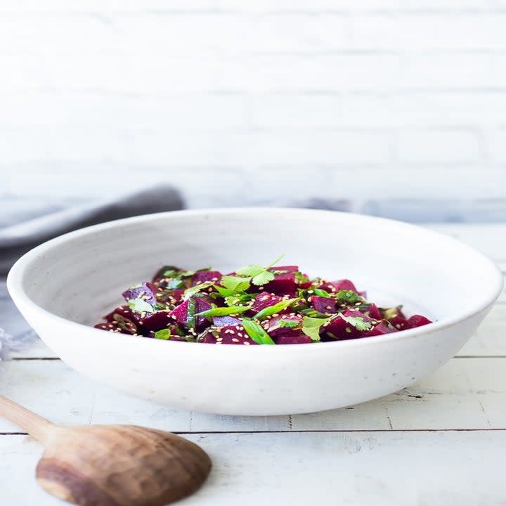 A bowl of marinated beets.