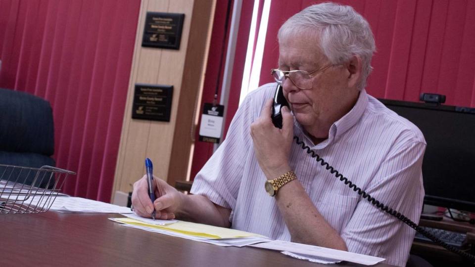 Eric Meyer, owner and publisher of the Marion County Record, on the phone with media Aug. 11, 2023, in his office that was raided by local police.