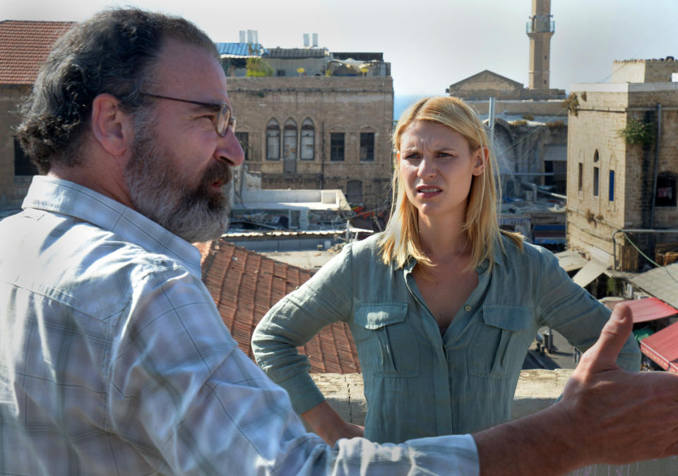 This undated image released by Showtime shows actors Claire Danes as Carrie Mathison, right, and Mandy Patinkin as Saul Berenson in a scene from the second season of "Homeland," filmed in Israel. The scene from a recent episode of the hit series "Homeland," is supposed to be Beirut - but it was shot in Tel Aviv, Israel. And that has some people irritated in both cities. (AP Photo/Showtime, Ronen Akerman)