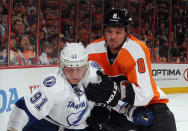 PHILADELPHIA, PA - MARCH 26: Nicklas Grossmann #8 of the Philadelphia Flyers hangs on to Steven Stamkos #91 of the Tampa Bay Lightning at the Wells Fargo Center on March 26, 2012 in Philadelphia, Pennsylvania. (Photo by Bruce Bennett/Getty Images)