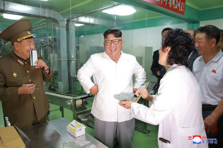 North Korean leader Kim Jong Un inspects 525 factory in this undated photo released by North Korea's Korean Central News Agency (KCNA) on July 24, 2018. KCNA via REUTERS