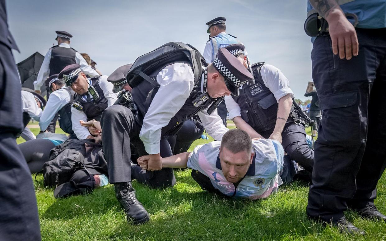 Police make arrests after scuffles during a counterprotest by trans activists at a rally in Hyde Park by Let Women Speak - Guy Corbishley/Alamy Live News