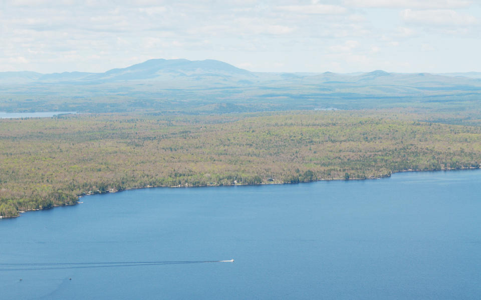 <h3>What to do:</h3> <p>On the shores of Moosehead Lake, Rockwood is the perfect base to visit the area’s natural wonders. An angler’s dream: trout, bass, and salmon fishing is available on the lake and fly-fishing on the Kennebec River. <a rel="nofollow noopener" href="https://mooseheadlakegolf.wordpress.com/our-shuttle/" target="_blank" data-ylk="slk:Moosehead Lake Golf;elm:context_link;itc:0;sec:content-canvas" class="link ">Moosehead Lake Golf</a> provides a shuttle from Rockwood to Mount Kineo for golfers and hikers alike from Memorial Day through Columbus Day weekends. The Bridle Trail is great for beginners, while the Indian Trail is more challenging: both are well worth it for the spectacular view at the summit.</p> <h3>Where to stay:</h3> <p>The lakeside <a rel="nofollow noopener" href="http://www.birches.com/" target="_blank" data-ylk="slk:Birches Resort;elm:context_link;itc:0;sec:content-canvas" class="link ">Birches Resort</a> was first built as a hunting and fishing lodge in the 1930s and retains all its L.L. Bean-esque charm. <a rel="nofollow noopener" href="http://www.maynardsinmaine.com/" target="_blank" data-ylk="slk:Maynard’s;elm:context_link;itc:0;sec:content-canvas" class="link ">Maynard’s</a> is another equally charming and rustic option, with a wrap-around porch decorated with antlers and furnished with rocking chairs.</p>