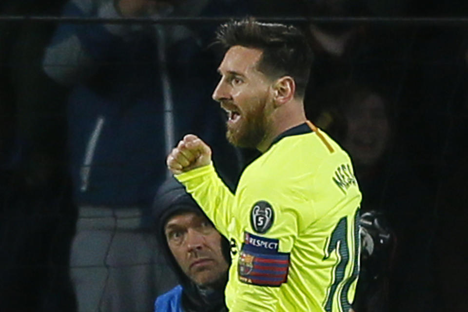 Barcelona forward Lionel Messi celebrates scoring his side's first goal during a Group B Champions League soccer match between PSV Eindhoven and Barcelona at the Philips stadium in Eindhoven, Netherlands, Wednesday, Nov. 28, 2018. (AP Photo/Peter Dejong)