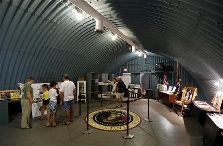 Guests visit the cold-war era nuclear fallout shelter constructed for U.S. President John F. Kennedy on Peanut Island near Riviera Beach, Florida November 8, 2013. REUTERS/Joe Skipper