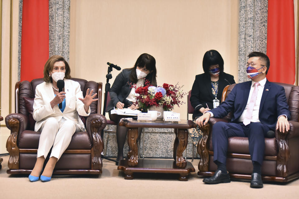 In this photo released by the Taiwan Legislative Yuan, U.S. House Speaker Nancy Pelosi, left, speaks during a meeting with Legislative Yuan Deputy Speaker Tsai Chi-chang in Taipei, Taiwan, Wednesday, Aug. 3, 2022. Pelosi, meeting top officials in Taiwan despite warnings from China, said Wednesday that she and other congressional leaders in a visiting delegation are showing they will not abandon their commitment to the self-governing island. (Taiwan Presidential Office via AP)