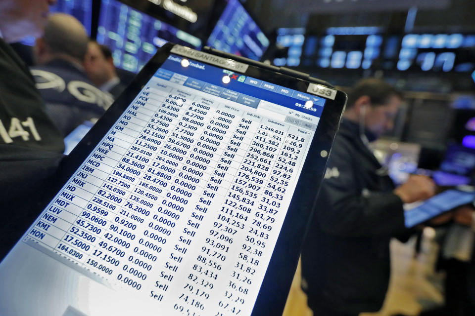 A trader's handheld device shows his sell orders on the floor of the New York Stock Exchange, Monday, March 9, 2020. The Dow Jones Industrial Average plummeted 1,500 points, or 6%, following similar drops in Europe after a fight among major crude-producing countries jolted investors already on edge about the widening fallout from the outbreak of the new coronavirus. (AP Photo/Richard Drew)